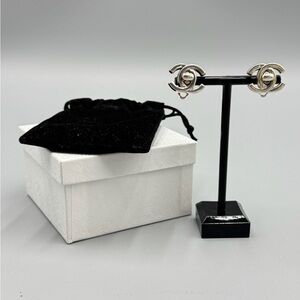 Chanel Silver Turn Lock Clip On Earrings